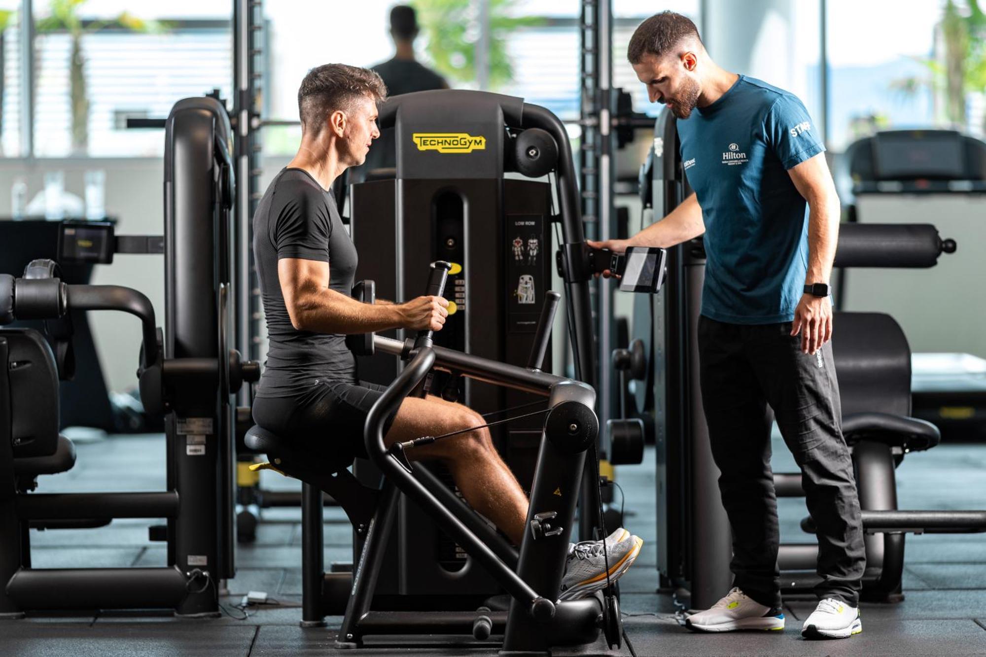 Hilton Rijeka Costabella Beach Resort And Spa المظهر الخارجي الصورة Personal trainer with a client